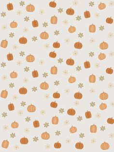 an orange and white pattern with pumpkins on it