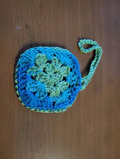 An ear bud holder, crocheted from cotton Ocean Wave colorway yarn. Crochet Crafts With Yarn, Crochet Yarn Crafts For Gifts, Crochet Yarn Crafts As Gifts, Earbud Holder, Ear Bud, Ocean Wave, Keychains, Yarn, Ships