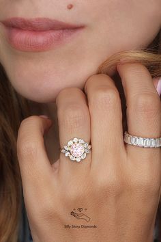 Pink Diamond Promise Ring With Halo Design, Pink Moissanite Diamond Ring As Gift, Pink Moissanite Rings As Gift, Pink Moissanite Ring For Gift, Elegant Pink Diamond Ring For Weddings, Pink Moissanite Ring Gift, Elegant Pink Diamond Wedding Ring, Feminine Pink Wedding Rings, Pink Round Diamond Ring, Fine Jewelry