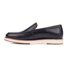 The Griffith loafer features an exquisite design with a stunning brogue detailing on the tongue and a classic slip-on style. Perfect for adding sophistication to any ensemble, the Griffith blends timeless elegance with ease of wear. Whether for a formal occasion or everyday functionality, these loafers ensure you look polished and refined with every step. Classic Black Plain Toe Slip-ons, Masculine Moc Toe Slip-ons For Formal Occasions, Classic Wingtip Slip-ons With Brogue Detailing, Classic Black Slip-ons With Brogue Detailing, Classic Black Slip-ons With Stitched Sole, Classic Wingtip Slip-ons With Rubber Sole, Business Casual Brogue-detailed Slip-on Moccasins, Business Casual Slip-on Moccasins With Brogue Detailing, Black Wingtip Slip-ons For Semi-formal Occasions