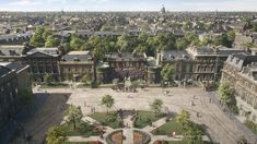 an aerial view of a large city with lots of buildings and people walking around it