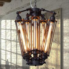 an old fashioned light fixture hanging from a ceiling