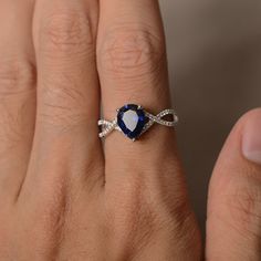 This is a gorgeous handmade creation. Its beauty is its simplicity & Elegance. The 7*9 mm pear shape faceted lab sapphire is crafted in solid sterling silver and with rhodium plated. All item is sent in a beautiful gift box If you have any idea of design your ring,pls contact me directly. You can realize more lovely stuff clicking the link https://www.etsy.com/shop/knightjewelry?refshopsection_shophome_leftnav Please leave the correct address and you phone number for delivering successfully. Teardrop Sapphire Ring With Accent Stones For Anniversary, Teardrop Sapphire Birthstone Ring For Anniversary, Teardrop Sapphire Anniversary Ring, Teardrop Sapphire Ring With Diamond For Gift, Teardrop Sapphire Rings For Anniversary, Teardrop Sapphire Diamond Rings, Pear Shaped Sapphire Rings For Anniversary, Pear-shaped Sapphire Ring, Sapphire Teardrop Promise Ring