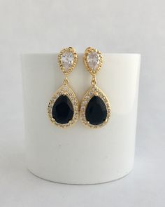 Brilliant & luxurious!! I've created the super sparkly best quality black cubic zirconia teardrop bridal set in gold plated brass setting. The includes : #Earrings feature a large teardrop with pear cut black cubic zirconia center surrounded by tiny round zirconia crystals. Teardrop dangles from a bright cubic zirconia ear stud. Total length of the earrings is 3.5 cms. #Necklace pendant featuring a large teardrop with pear cut black cubic zirconia center surrounded by tiny round zirconia cry Black Pear-shaped Jewelry For Weddings, Black Pear-shaped Wedding Jewelry, Black Wedding Jewelry, Gold Bridesmaid Jewelry, Rose Gold Earrings Wedding, Rose Gold Bridal Jewelry, Black Crystal Earrings, Black Gold Wedding, Black Bridesmaid