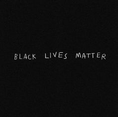 the words black lives matter written in white chalk