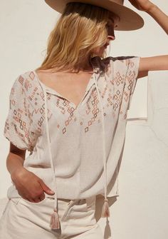 Women's Boxy Off White Bohemian Embroidered Top | LOVESTITCH Casual V-neck Top With Tie Sleeves, Summer V-neck Top With Tassels, Summer V-neck Tops With Tassels, Casual V-neck Blouse With Tassels, Bohemian V-neck Blouse For Loungewear, Summer Beach Blouse With Back Tassel Tie-up, Summer V-neck Blouse With Back Tassel Tie-up, Casual Beige Embroidered Summer Top, Spring V-neck Blouse With Tassel Ties