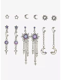 six pairs of earrings with chains and moon charms on the bottom, all in different styles