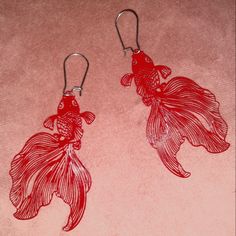 Pretty Flowy Goldfish Earrings Fins Almost Seem Like A Flower To Me. Maybe A Beta Fish. So Lightweight I Call Them Feather Weight, Very Delicate , Intricate Hollow Cut Out Design. Shiny Red Color I Also Sell Bubble Eye Goldfish Earrings In Red Other Colors And Styles Available In My Closet. Approximately 2.5" X 1.5" These Face Forward, But Like Many Hanging Earrings, I Can Orient Them To Face Sideways If You Prefer. I Made These Face Left And Right - Mirrored Instead Of Two Exactly The Same. Sil Red Beta Fish, Goldfish Earrings, Bubble Eye Goldfish, Fancy Goldfish, I'm Jealous, Fish Earrings, Beta Fish, Face Forward, Hanging Earrings