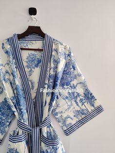 This kimono is made very neatly, and the matching strap has also been used in almost many places in the kimono, which makes the kimono very much. giving a beautiful look It looks good in the photo, but it looks great after wearing this kimono 100% Soft Cotton Hand Block Print Fabric Robe. The perfect to cover up your dance costume, to use for a dinner party or just slip into in on a beautiful summer morning. This particular beauty has a Japanese feeling to it. Cotton kimono robes are perfect for lounging around the home or spa. Use our Floral Hand block print robe :) Measurements: Size: Short & Free Size/ Plus Size Bust Approx: 120 CM ( 47 inch ) You can choose any length in this listing Length: 80 CM, 100 CM, 120 CM, 140 CM You can choose any color in the this listing * BLUE TIGER  * DARK Plus Size Lounge Wear Outfit, Fancy Robes, Night Wear Dress, Bridesmaid Kimono, Kimono Robes, Summer Kimono, Printed Robe, Floral Robes, Cotton Kimono