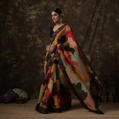 Print sarees are versatile and stylish garments that come in a wide range of prints, including florals, geometric patterns, and abstract designs. They also feature handloom prints like Kalamkari and Batik sarees. These sarees are suitable for both casual and formal occasions and can complement any skin tone. Explore our exclusive collection of print sarees. Festive Multicolor Unstitched Pre-draped Saree, Bollywood Style Multicolor Pre-draped Saree For Navratri, Bollywood Multicolor Pre-draped Saree For Navratri, Festive Georgette Kalamkari Dupatta, Georgette Dupatta With Kalamkari Print In Traditional Drape, Traditional Kalamkari Print Georgette Pre-draped Saree, Traditional Kalamkari Pre-draped Georgette Saree, Festive Multicolor Chanderi Pre-draped Saree, Multicolor Silk Pre-draped Saree With Kalamkari Print