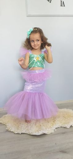 This special mermaid costume, which is my own design, is very cool and very useful, it will suit your girls' special days, birthdays and costume parties ... In our dress, special excellent quality fabric with sequin and sequin embroidered satin cotton lining is used, crystal-layered tulle is used on the hem, waist and shoulders, and a bustier buckle decorated with pearls and starfish is included. If desired, it can be sewn as a mother-daughter combination, if you have such a request, write to me Mermaid Costume For Kids, Toddler Mermaid Costume, Toddler Mermaid Costumes, Mermaid Costume Kids, Costume Mermaid, Mermaid Custom, Handmade Mermaid, Costume For Kids, Mermaid Theme Party