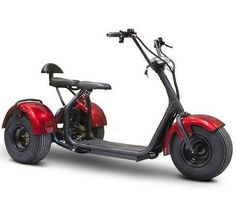 an electric scooter with two wheels and a seat on the front is shown