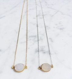 Mrs. Parker Necklace in White Druzy / 14K GOLD FILLED CHAIN / Traditional Lobster Claw clasp | A Blonde and Her Bag The Mrs Parker in Druzy, 16" in length, your choice of 14k gold filled or sterling silver chain, with a faceted, 14k gold bezel set semi- precious stone | 1-800-Flowers Birthday Delivery Mrs. Parker Necklace In White Druzy - Gold White Necklace With Round Pendant And Cable Chain, White Round Pendant Necklace With Cable Chain, White Necklace With Delicate Chain, White Gemstone Necklace For Party, White Gemstone Party Necklace, White Birthstone Necklace For Formal Occasions, Formal White Birthstone Necklace, White Jewelry With Delicate Chain And Round Shape, White Jewelry With Delicate Chain