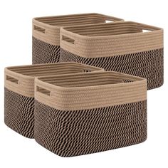 three woven storage baskets with handles in brown and beige color, set on white background