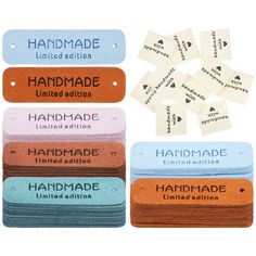 the handmade labels are laid out on top of each other, with different colors