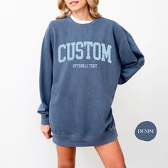 "🌟Comfort Colors® Custom Sweatshirt, College Letters Sweats, Vintage Custom Shirt, Personalized Sweatshirt, Customized Gift, Custom Design🌟 👉 MATERIAL & FIT: Luxurious comfort and style are what this unisex, garment-dyed sweatshirt is all about. It's made with 80% ring-spun cotton and 20% polyester and the fabric is 3-end garment-dyed, ring-spun, color-blast fleece with a 100% cotton face. Each sweatshirt comes with a relaxed fit, a rolled-forward shoulder, and a back neck patch.  .: 80% ring-spun cotton, 20% polyester .: Medium-heavy fabric (9.5 oz /yd² (322.1 g/m .: Relaxed fit .: Sewn in twill label .: OEKO-TEX certified low-impact dyes 👉 HOW TO ORDER: 1️⃣ Please, check and review all the photos. 2️⃣ Select Your Size, Type of T-shirt or Sweatshirt and Color from drop down menus. 3️⃣ Customizable Blue Varsity Top, Blue Customizable Varsity Tops, Customizable Blue Collegiate Tops, Casual Long Sleeve Tops With Custom Text, Customizable Collegiate Crew Neck Sweatshirt, Customizable Cotton Sweatshirt For Loungewear, Customizable Casual Blue Sweatshirt, Sporty Cotton Sweatshirt With Custom Text, Relaxed Fit Varsity Crew Top