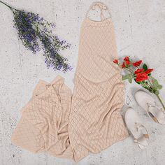 This summer beach cover-up is a must-have! This summer halter dress is made to lounge in all day and then dress up for a day out. Easily pair this dress with your heels or strappy sandals and your best summer accessories for a cute beach day.MEASUREMENTS: Small | Bust: 36"-38"in | Waist: 26"-28"inMedium | Bust: 38"-40"in | Waist: 28"-30"inLarge | Bust: 40"-42"in | Waist: 30"-32"in Chic Halter Neck Sundress For Beach Season, Beige Halter Neck Sundress For Vacation, Beige Halter Neck Sundress For Summer, Beige Halter Dress For Beach, Beige Halter Neck Summer Maxi Dress, Beige Halter Neck Dress For Beach, Beige Halter Neck Dress For The Beach, Beige Sundress For Summer Beach Cover-up, Beige Sundress For Summer Beach