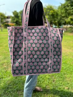 The Indian Hand Block Printed Cotton Quilted Women's Handbags from Rajasthan India. This Handbag is completely Indian Printed on good quality cotton. this cotton quilted shopping bag is totally unique and multi purpose. Use this for your grocery or as a travel bag. Perfect to suit all. Item :- Cotton Handbag Material: Quilted Cotton Fabric Color - as you like Pattern: Floral Block Print Style: Tote Bag, Handle Bag, Shoulder Bag Size in Inch:- 18 x 18 x 6 inches    Product Work: Printed & quilted Eco-friendly Multicolor Vacation Bags, Eco-friendly Large Capacity Multicolor Bag, Eco-friendly Multicolor Square Bag, Multicolor Quilted Tote Bag, Eco-friendly Multicolor Rectangular Beach Bag, Cotton Handbag, Indian Prints, Kids Items, Boho Bags