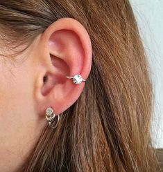 MUCH HAVE Minimal and small moon conch piercing/hoop earring.Super versatile and they're perfect to wear in multi pierced ears.PLEASE NOTE, this listing is for one real conch hoop earring ( for pierced ears), if you want one Ear Cuff for non pierced ears ( Fake Piercing), please buy it here:https://www.etsy.com/listing/663036982/moon-ear-cuff-conch-piercing-celestial?ref=shop_home_active_1&pro=1&frs=1Matching stud earrings available here:https://www.etsy.com/listing/609797552/moon-earrin Trendy Single Round Cartilage Earring, Trendy Round Single Earring Piercing, Moon Conch Piercing, Dainty Round Ear Cuff For Pierced Ears, Adjustable Round Ear Cuff For Everyday Wear, Dainty Round Ear Cuff, Adjustable Round Wrap Earrings, Everyday Round Ear Cuff With Ear Wire, Adjustable Small Hoop Single Ear Cuff