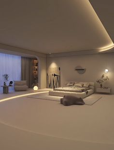 a large white bed sitting in the middle of a room