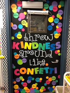 a door with words painted on it that says, know kindness around like confetti