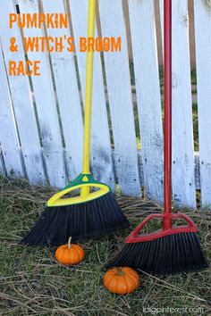 two brooms are sitting in the grass