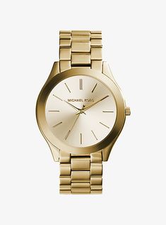 A perennial favorite, our iconic Runway watch gets a slim update just in time for the holidays. We love how the sleek, understated dial reads modern, and in gold-tone stainless steel, easily adds a gilded touch to your favorite looks. Stack it with an arm full of gold jewelry for your off-duty days, or slip it on as its own standout piece when you’re headed to the office. Outlet Michael Kors, Michael Kors Runway, Watches Women Michael Kors, Gold Michael Kors Watch, Analog Watch, Skagen, Women Wrist Watch, Watch Model, Stainless Steel Band