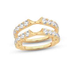 two gold rings with diamonds on each side