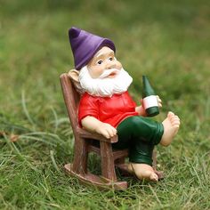 a gnome sitting in a chair holding a bottle