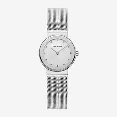 Classic, puristic, and yet exciting. Perfect style combined with contemporary minimalism. Inspired by Danish design, the CLASSIC COLLECTION represents a unique timepiece, perfectly highlighting your daily style.The polished silver colored stainless steel case, made of pure, high quality, medical-grade stainless steel (316L), in combination with the modern silver colored milanese strap, provides the classic BERING look. The fine workmanship of the milanese strap gives the watch a refined, almost Modern Watches With Bracelet Strap, Minimalist Silver Analog Watch, Formal Minimalist Watch With Bracelet Strap, Minimalist White Everyday Watch, White Minimalist Everyday Watch, Minimalist Silver Watch With Bracelet Strap, Minimalist Silver Watches With Bracelet Strap, Minimalist Watch Accessories With Subdials, Modern Watch With Bracelet Strap As Gift