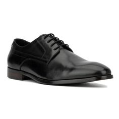 Looking to step up your office shoe game? The Elias oxford might just be what you've been searching for. Crafted from a smooth genuine leather upper, this timeless and classic style features an elegant lace-up design that exudes sharpness without being ostentatious. Perfect for adding sophistication to your professional attire, the Elias oxford ensures you look polished and refined in any office setting, making it a must-have for your wardrobe. Black Round Toe Oxfords For Business Meetings, Black Leather Sole Dress Shoes For Business Meetings, Black Plain Toe Business Dress Shoes, Plain Toe Black Business Dress Shoes, Black Dress Shoes With Leather Sole For Business Meetings, Black Plain Toe Dress Shoes For Business, Black Wingtip Leather Shoes For Business, Masculine Black Oxfords For Business, Black Wingtip Leather Shoes For Business Meetings