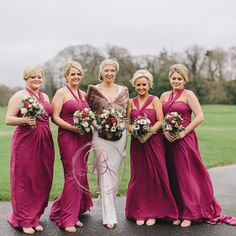 a group of women standing next to each other