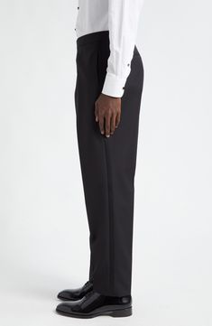 Elevate your formal or evening look with these tuxedo pants impeccably tailored from a refined wool-and-mohair blend and finished with satin side stripes. Zip fly with hook-and-bar tab closure Side-seam pockets; back welt pockets Cupro lining 84% wool, 16% mohair Dry clean Made in Turkey Designer Clothing Luxury Straight Leg Dress Pants For Evening, Timeless Black Tuxedo For Evening, Black Wool Bottoms For Evening, Elegant Party Pants With Pressed Crease, Elegant Fitted Evening Pants, Black Tuxedo With Pressed Crease For Evening, Luxury Wool Pants For Evening, Classic Evening Tuxedo With Structured Boning, Black Evening Tuxedo With Pressed Crease