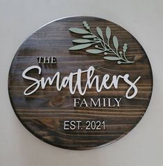 a wooden sign that says the smothers family