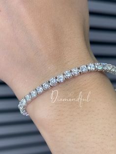 DETAILS: * Handmade item * Gemstone: Lab-grown Diamonds * Band Color: White Gold (may vary on gold selection) * Condition: Never been Used; Made to order, Recycled Metal, Conflict-free 100% DESCRIPTION:  💎 Welcome to the Our Shop, Congratulations 🍾 on discovering us. 💎   Classic and Beautiful design, this women's Tennis bracelet is a stunner. This custom-made to-order lab-grown diamond tennis bracelet is the perfect gift for all gorgeous gorgeous girls who love to look fabulous. A row of scintillating lab-created round brilliant diamonds are lined up perfectly to create the most glamorous diamond bracelet. Made with a double secure lock at the back. Thanks to our trained gemologist who inspects every one of them! A popular cut, this simple, yet stunning style has become one of today's f White Gold Round Bracelet For Anniversary, Anniversary Sterling Silver Bracelet With Prong Setting, Sterling Silver Bracelet With Prong Setting For Anniversary, Sterling Silver Anniversary Bracelet, Anniversary Gold Jubilee Bracelet, Anniversary Tennis Bracelet With Prong Setting, Diamond Cut Round Bracelets For Anniversary, White Round Tennis Bracelet For Anniversary, Round Diamond Jubilee Bracelet For Anniversary