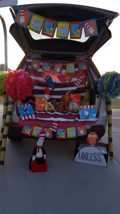 the trunk of a car is decorated with dr seuss and cat in the hat decorations