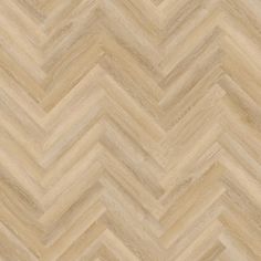 an image of wood flooring that looks like chevroned herringbones in beige