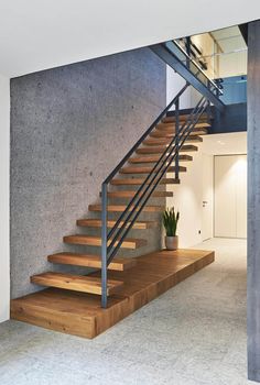 the stairs are made of wood and steel