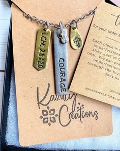 Personalized Mixed Metal Hand-stamped necklace with 3 stamped charms. Are you in need of COURAGE?  Are you facing difficult situations?  Is it time to stop being afraid, and move forward with courage and conquer all thats ahead?  This necklace design includes 3 hand-stamped charms:  One charm is stamped with the word "Courage", another charm is stamped with a cross, and another charm is hand-stamped with the scripture reference, 1 Chronicles 28:2.   "Then David said to his son Solomon, "Be strong and courageous, and do the work. Don't be afraid or discouraged, for the Lord God, my God, is with you. He won't leave you or forsake you until all the work for the service of the Lord's house is finished."  Choose this necklace or design your own by submitting your "word" and scripture reference Word Necklace, Its Time To Stop, Be Strong And Courageous, Hand Stamped Necklace, Hand Stamped Jewelry, 12 Days Of Christmas, Stamped Jewelry, Hand Designs, Personalized Necklace