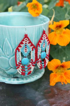 Turquoise Large Beads Drop Earrings, Turquoise Drop Earrings With Large Beads, Unique Turquoise Beaded Earrings, Red Beaded Earrings With Large Beads, Turquoise Earrings With Large Beads For Gifts, Red Beaded Drop Earrings With Large Beads, Red Bohemian Beads For Crafting, Traditional Red Beaded Earrings With Large Beads, Handmade Red Beaded Earrings For Festival