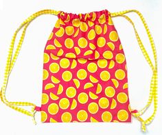 a drawstring bag with lemons on it