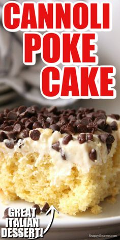 a close up of a piece of cake on a plate with chocolate chips and cream