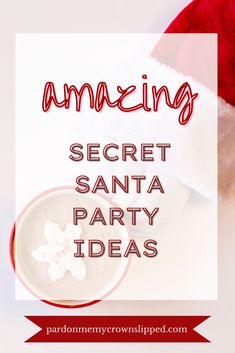 a santa hat sitting on top of a white table next to a cup of coffee