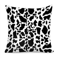 a black and white pillow with an animal print on it's front side,