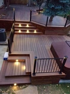 a deck with stairs and lights on it