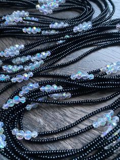 🖤 Hey beautiful! The waistbead you've been waiting for is finally here, elevate your waist adornment with our luxurious Tie On waistbead from the 'Graceful Adornments luxury waist Beads: A Proverbs 31 Waistbead Collection. 🖤 The adjustable TIE-ON design ensures a perfect fit, allowing you to customize the length to your preference for a comfortable and secure wear. 🖤Simply select your size from the drop-down menu to ensure the perfect fit for your individual style and needs. Priced PER strand Elegant Round Beads Waist Beads For Party, Elegant Round Waist Beads For Parties, Elegant Waist Beads With Faceted Beads For Party, Elegant Party Waist Beads With Faceted Beads, Elegant Party Waist Beads With Polished Beads, Elegant Colorful Waist Beads For Party, Elegant Colorful Party Waist Beads, Elegant Beaded Waist Chain For Festivals, Black Waist Beads