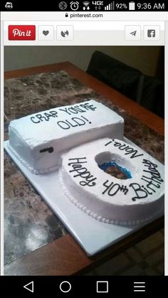 two birthday cakes sitting on top of a table