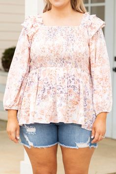 Everything will be just peachy when you wear this amazing top! This cutie has a super flattering smocked bodice with adorable ruffles on the shoulders! The floral pattern is so stunning and the peach color is neutral enough to pair with all of your faves! Style this with jean shorts and sandals for a super cute look! 100% Polyester Feminine Pink Smocked Top For Fall, Feminine Spring Peasant Top With Smocked Back, Pink Smocked Top With Floral Print For Brunch, Feminine Floral Smocked Top For Fall, Pink Floral Smocked Top For Brunch, Feminine Flowy Smocked Top With Floral Print, Feminine Fall Smocked Top With Floral Print, Babydoll Top, Peach Color