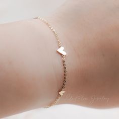 Dainty graduating small heart disc stacking bracelet made in 14K solid gold * Metal: 14K Yellow Gold * Coin size: approx. 3-6mm * Length: adjustable, total of 6.75" approx. * Stamp: 14K * Guaranteed Authentic Solid Gold, Not Plated or Filled ❤️Visit our official website for exclusive new products. https://elekalonjewelry.com/ ❤️Follow us on Instagram @ elekalonjewelry for the latest projects and much more! ❤️If you have any questions, please feel free to message us. Adjustable Wedding Chain Bracelet With Heart Charm, Adjustable Heart Charm Chain Bracelet For Wedding, Dainty Adjustable Bracelet With Heart Pendant, Dainty Adjustable Heart Pendant Bracelet, Dainty Heart Bead Bracelet Jewelry, Dainty Heart Beaded Jewelry Bracelet, Delicate Adjustable Heart Bracelet For Anniversary, Dainty Heart Beads Bracelet, Stackable Heart Bracelet For Valentine's Day