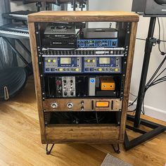 an old radio and sound equipment in a room